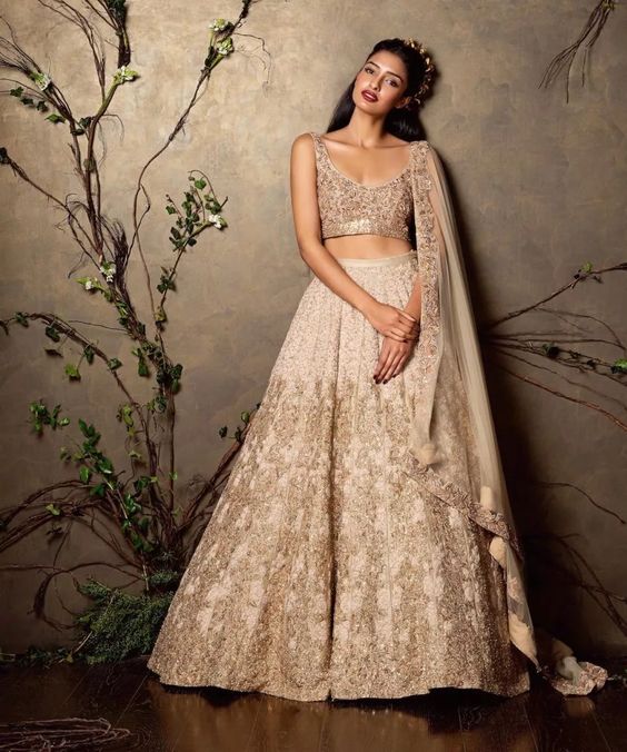 image of lehenga in champagne-gold color